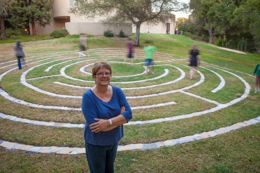 University Pastor Melissa Maxwell-Doherty in front of the labyrinth. (Photo credit: Brian Stethem/CLU)