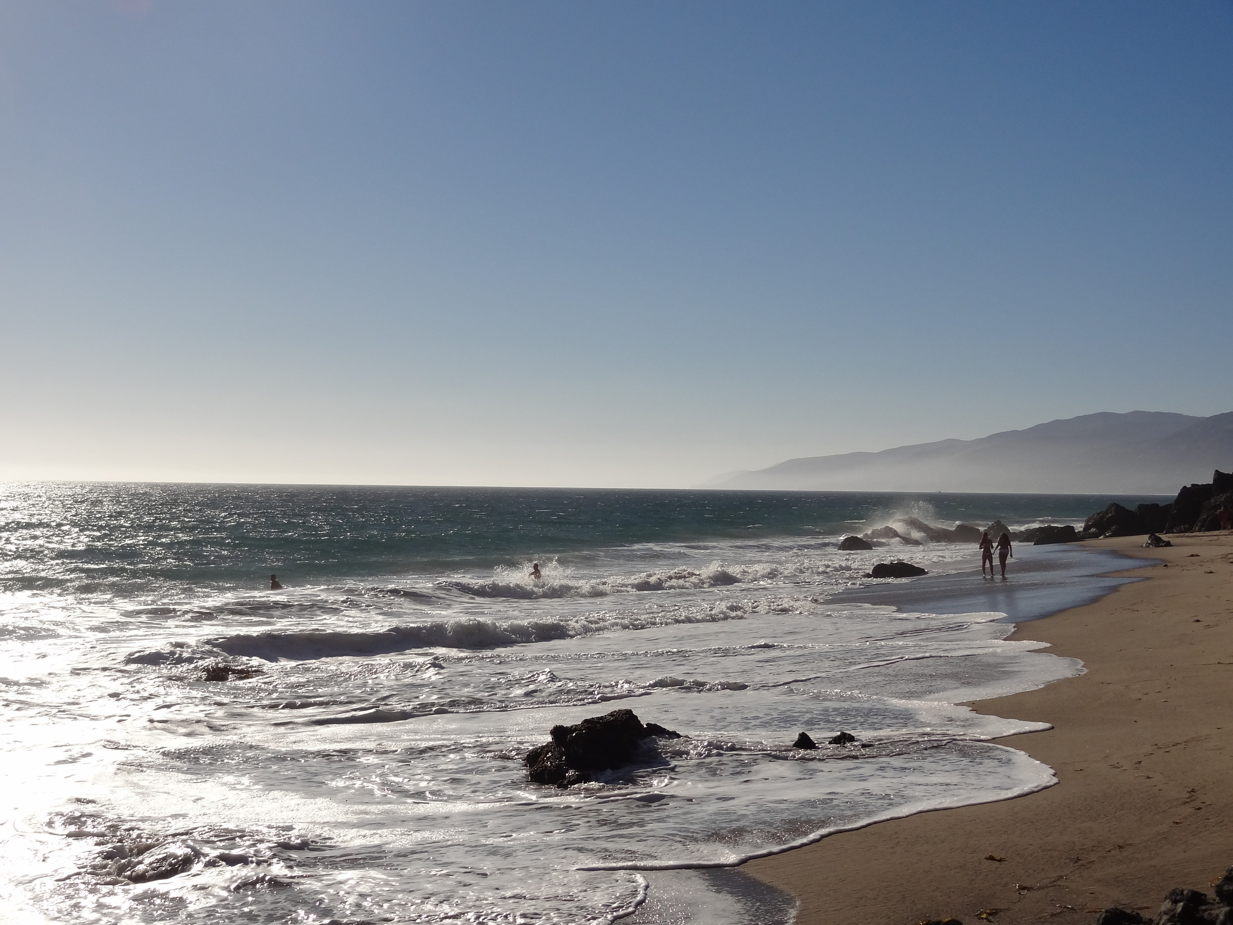 ZUMA BEACH, CALIFORNIA, USA - Lifeguard watching swimmers on Zuma