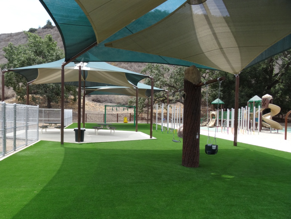 Phase of dreamcatcher playground features gently sloping turf hills and other neat features