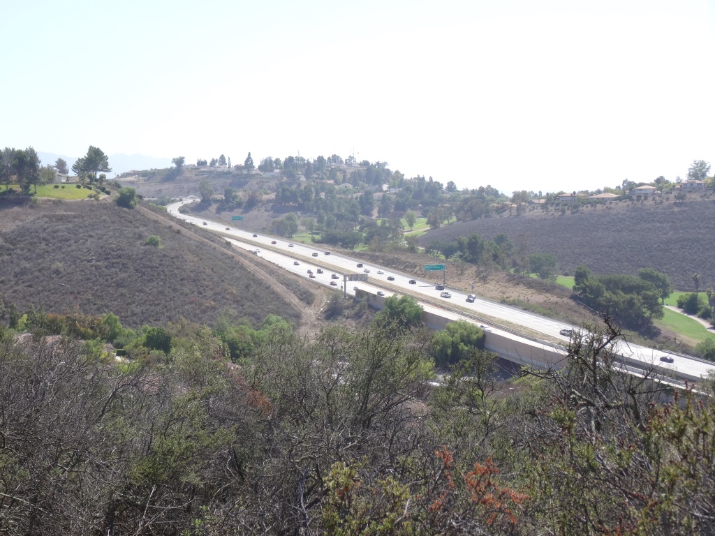 Continue on the trail until it loops around and goes south., parallel to Highway 23