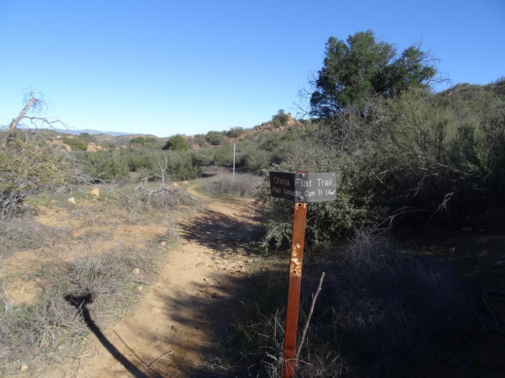 Follow the trail to reach the China Flat area.
