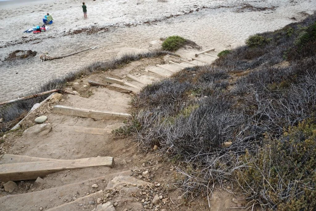 Bottom half of the steps from the parking lot to El Pescador Beach.