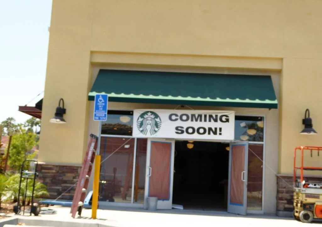 The new Starbucks drive thru will be opening on July 14th. Start your engines.