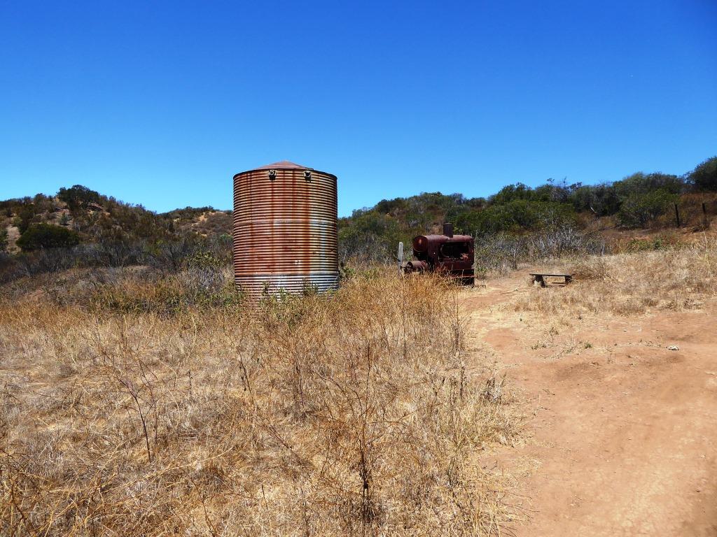 Eventually, after a bit of a grueling climb (this hike is not kid friendly if you ask me), you'll reach this corral area. Continue west (left).