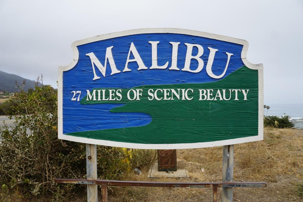 This "27 Miles of Scenic Beauty" sign was swapped out for "21 Miles of Scenic Beauty" sign in April 2017 in order to correct the actual length of City of Malibu coastline.