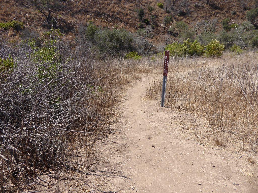 This Mugu Peak Trail sign is located near the south end of the Loop Trail.