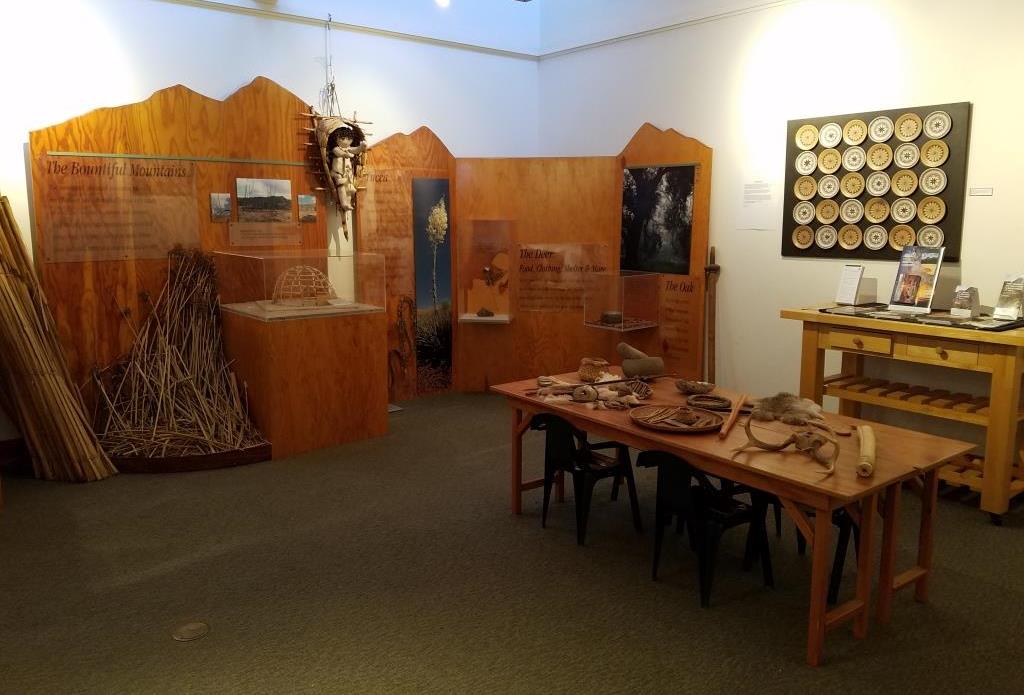 Inside the Culture Center. The table contains items that children are encourage to touch.