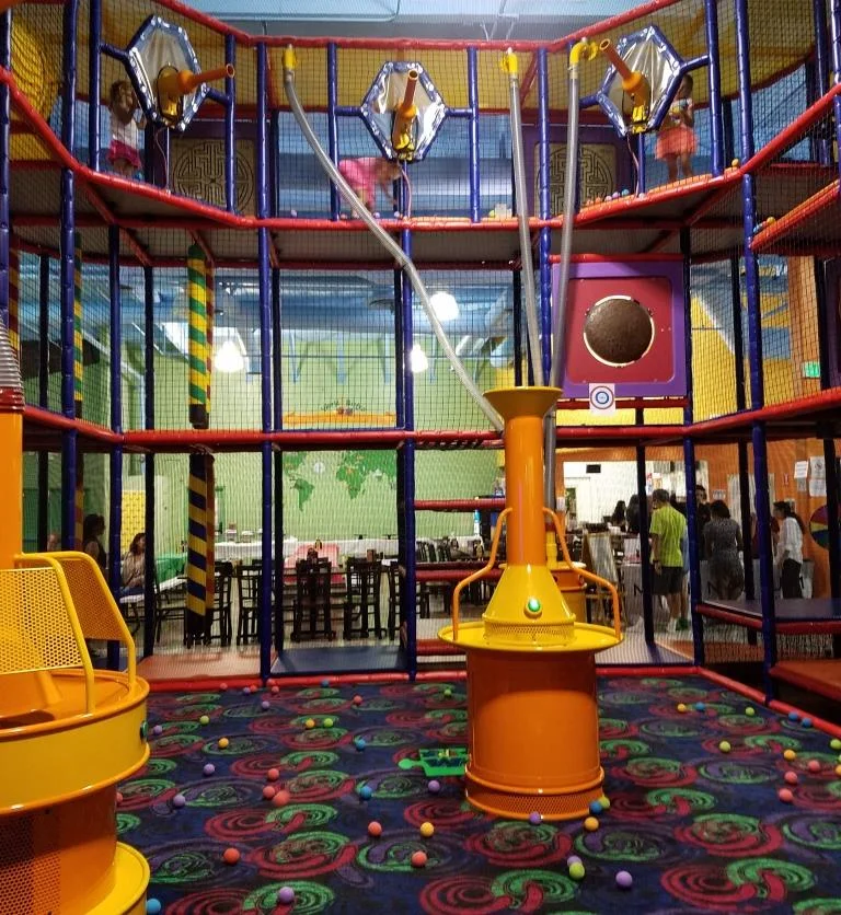The three story foam ball projectile and climbing area at Kids World in Oak Park.