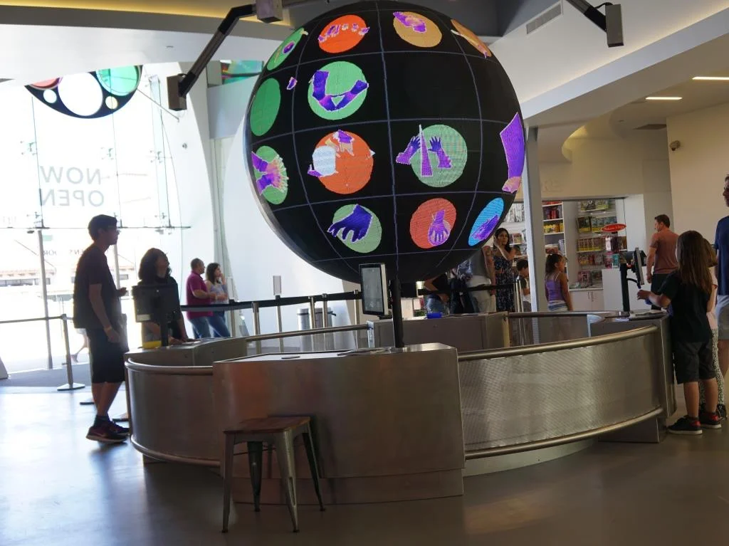 The handprint globe exhibit near the entrance to the Museum.