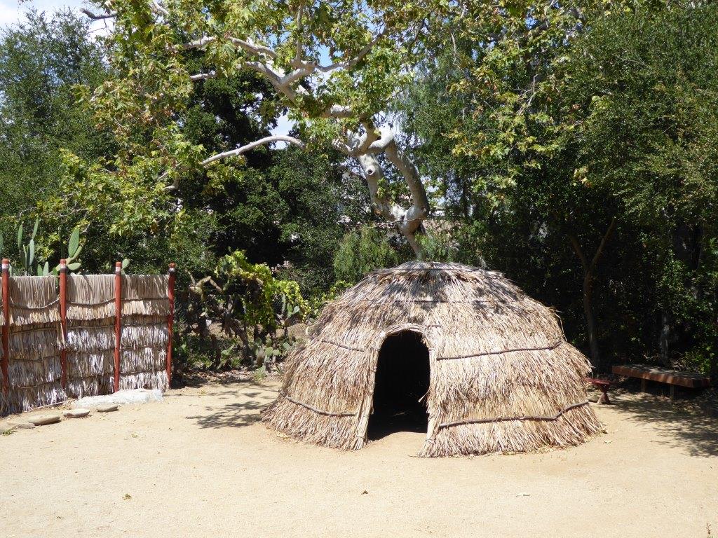 There is also a Chumash 'ap on display as part of a Chumash Village exhibit at the Stagecoach Inn Museum in Newbury Park .