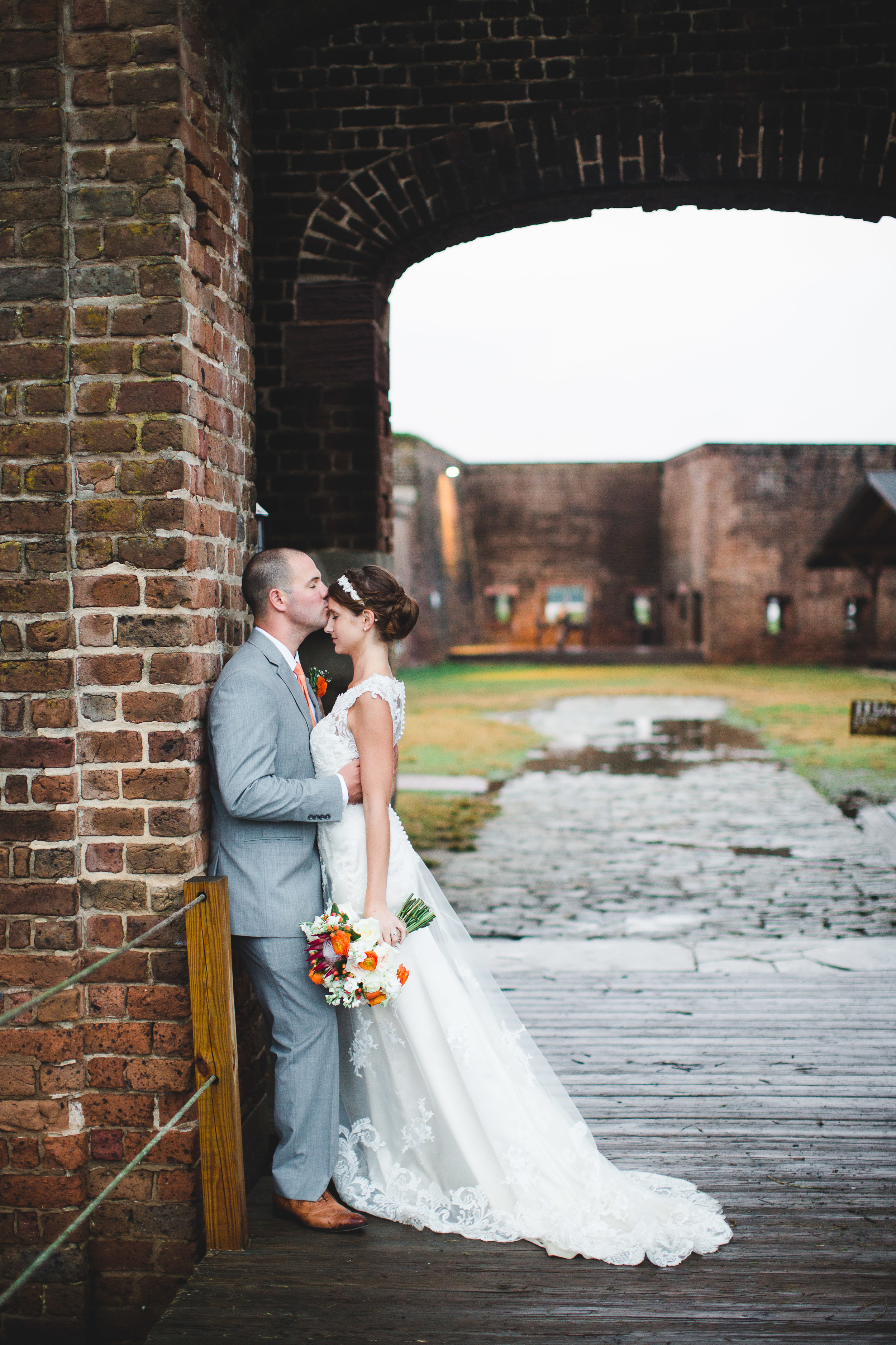 izzy-hudgins-photography-ivory-and-beau-bridal-boutique-savannah-wedding-planner-savannah-wedding-planning-old-fort-jackson-wedding-historic-wedding-savannah-wedding-florist-rustic-bohemian-wedding-savannah-wedding-savannah-weddings-40.jpg