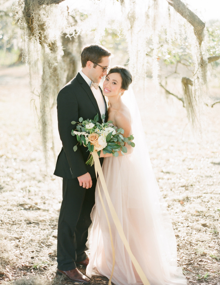 the-happy-bloom-wormsloe-elopement-wormsloe-wedding-ivory-and-beau-bridal-boutique-savannah-bridal-boutique-savannah-wedding-planner-sarah-seven-blushing-a-lowcountry-wedding-design-studio-south-2.png