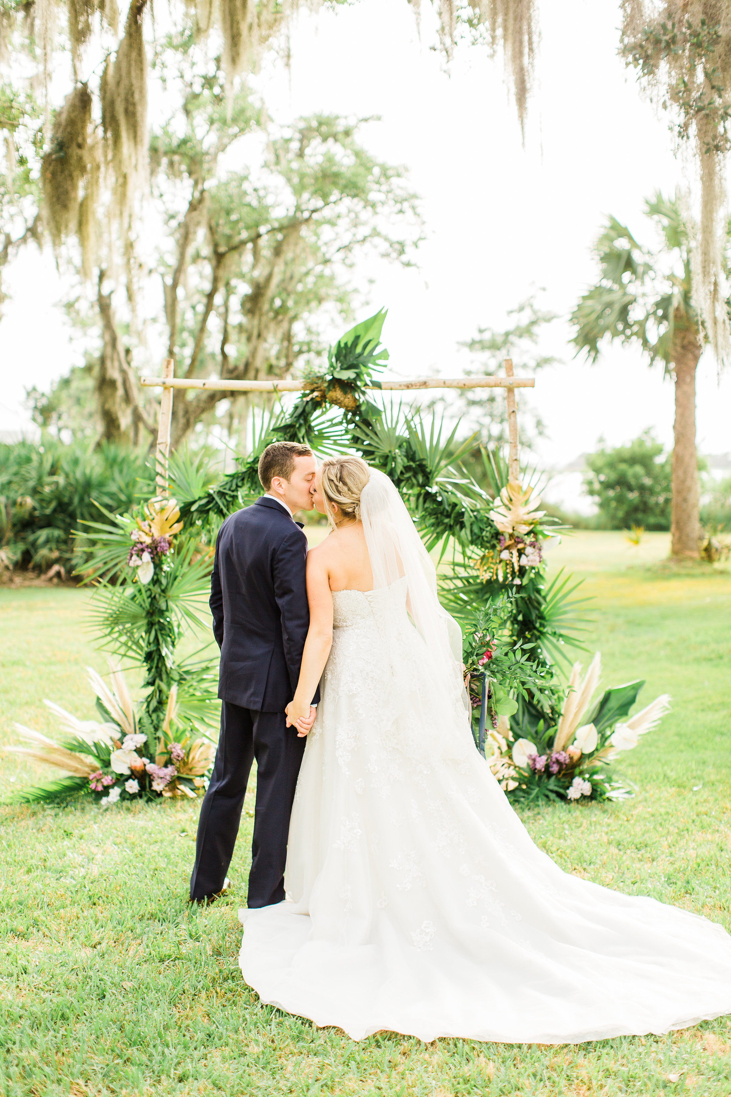 savannah-bridal-shop-i-and-b-couple-gretchen-and-alex-fun-and-unique-tropical-wedding-at-captains-bluff-st-simons-island-wedding-marianne-lucille-photography-26.jpg