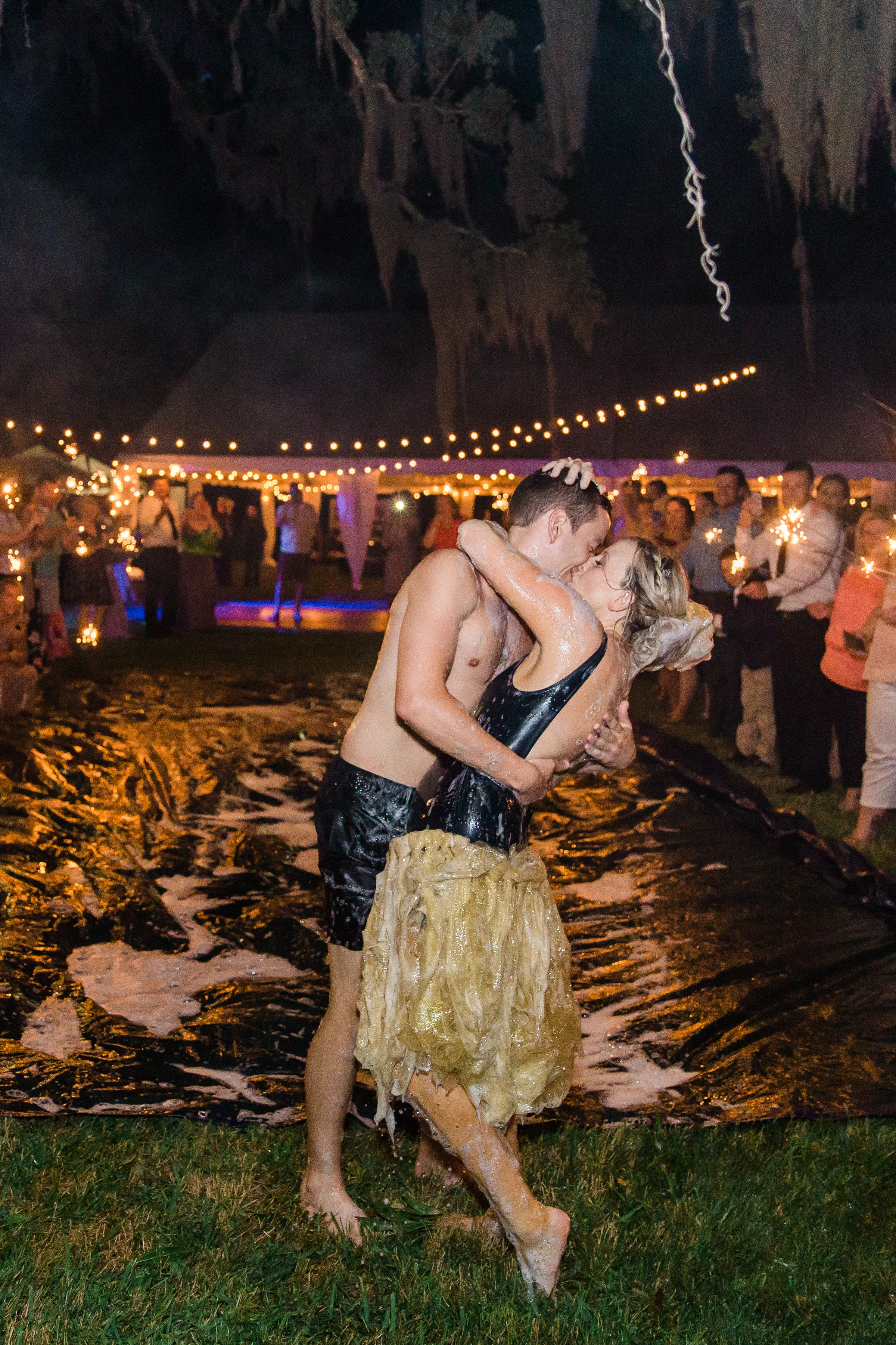 And to make this day even better? They ended their reception with a slip-and-slide!! How freaking cool is that?!