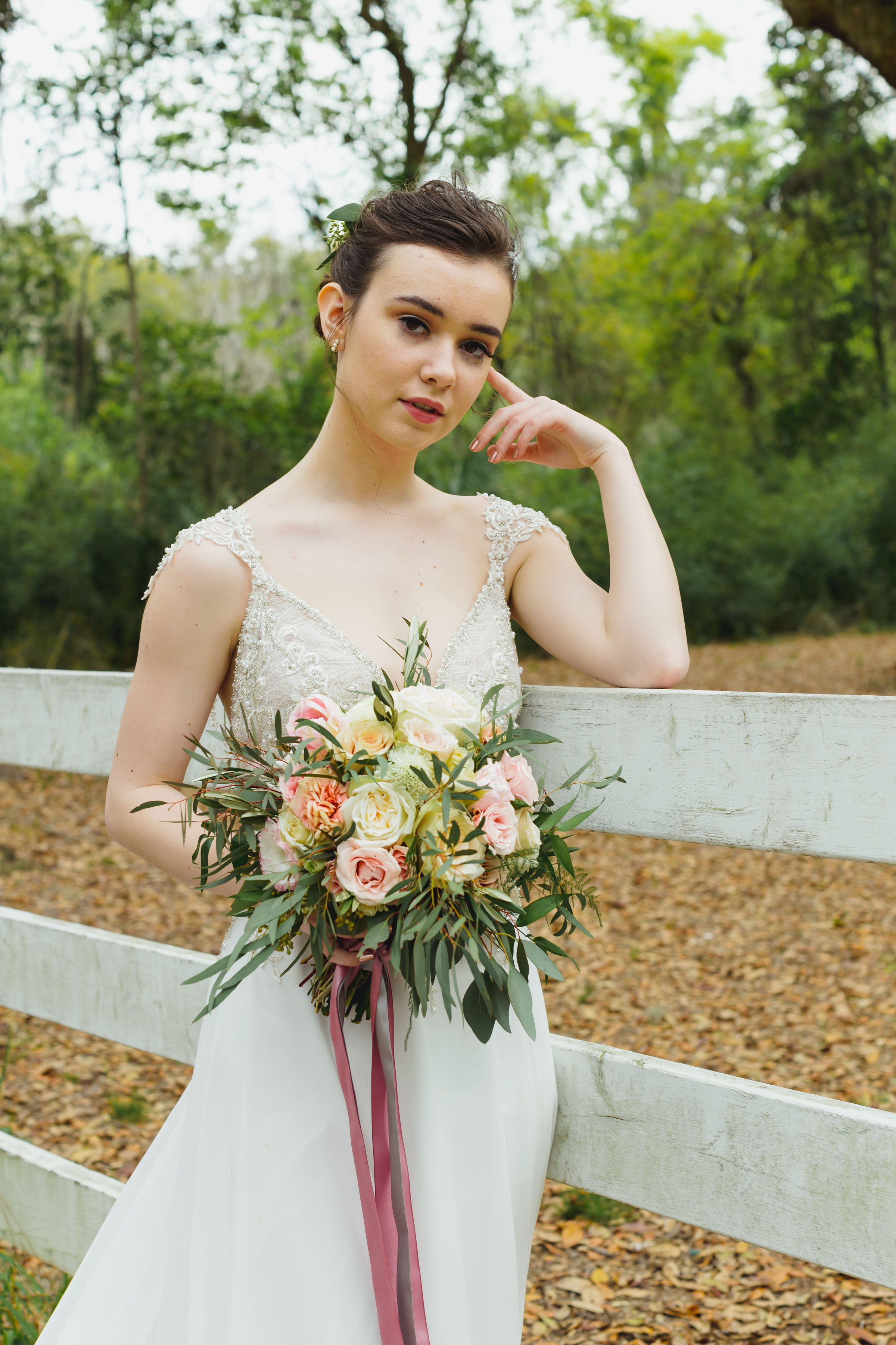 This exquisite A-line wedding dress is Gabor by Maggie Sottero Designs . One of our favorite details about this gown are those gorgeous bling-covered cap sleeves! They add so much glitz to this gown, and make a more casual gown something so elegant.