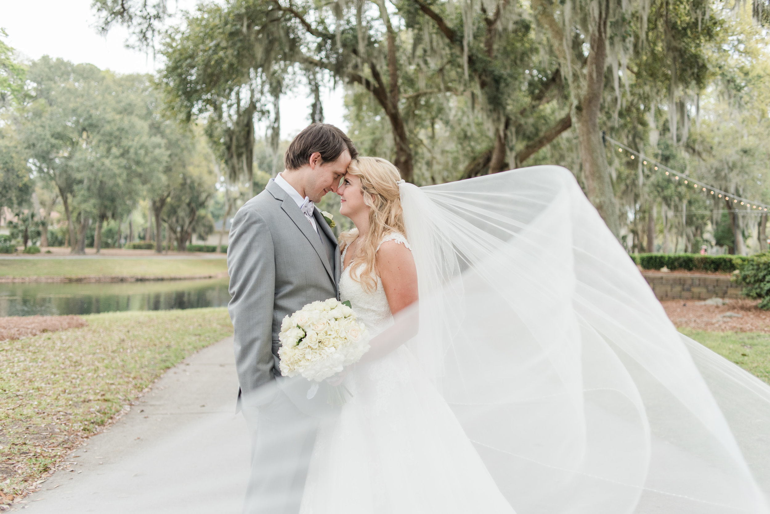 savannahbrides-southernbrides-southernweddings-savannahbrides-savannahweddingdressshops-ballgowndresses-blueandtealbridesmaids-simplesouthernflowers9.jpg