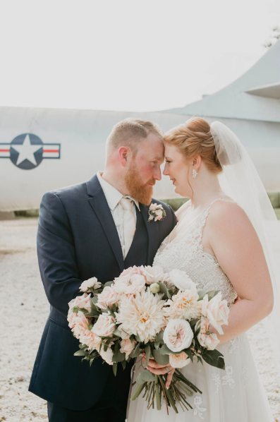 ivory-and-beau-couple-brittany-and-donald-blog-savannah-wedding-planner-savannah-florist-mighty-eighth-airforce-museum-19.png