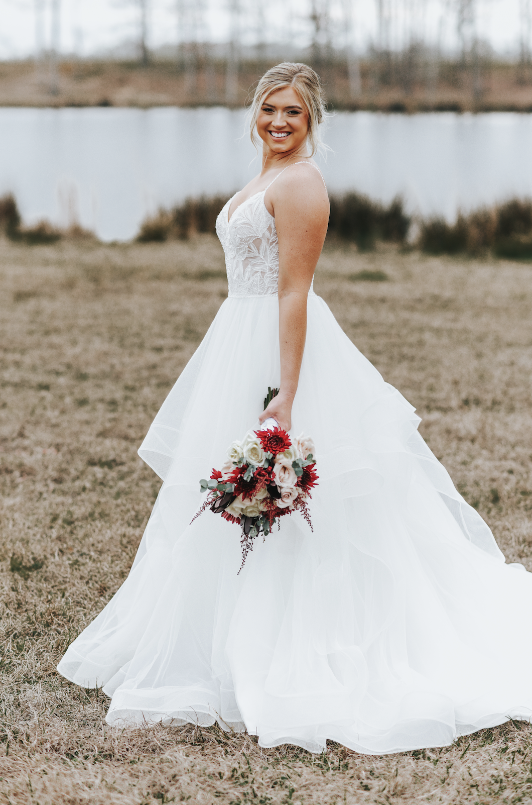real-savannah-bride-rebecca-wearing-the-timbrey-gown-by-maggie-sottero-romantic-ballgown-with-tiered-tulle-skirt-horsehair-trim-spaghetti-straps-lace-purchased-from-savannah-bridal-shop-and-savannah-bridal-boutique-ivory-and-beau-2.png
