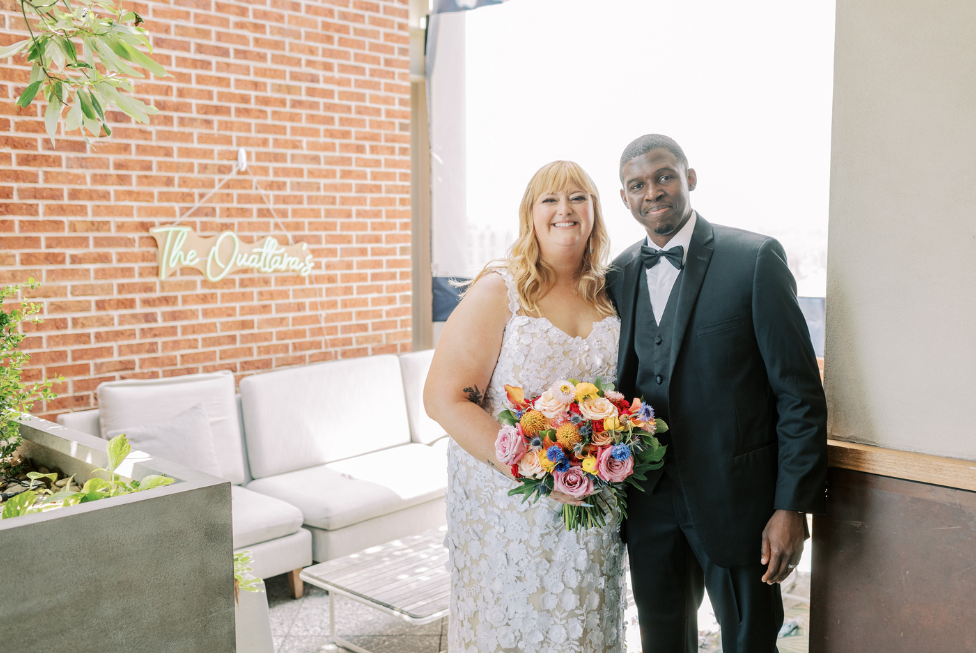 ivory-beau-couple-florals-savannah-wedding-alida-hotel-colorful-florals.png