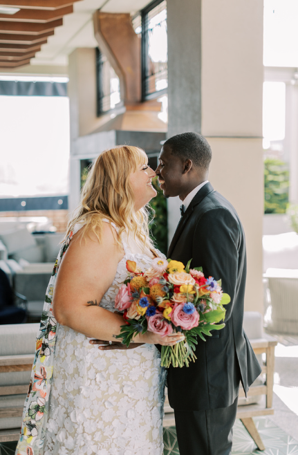 ivory-beau-couple-florals-savannah-wedding-alida-hotel-colorful-florals-2.png