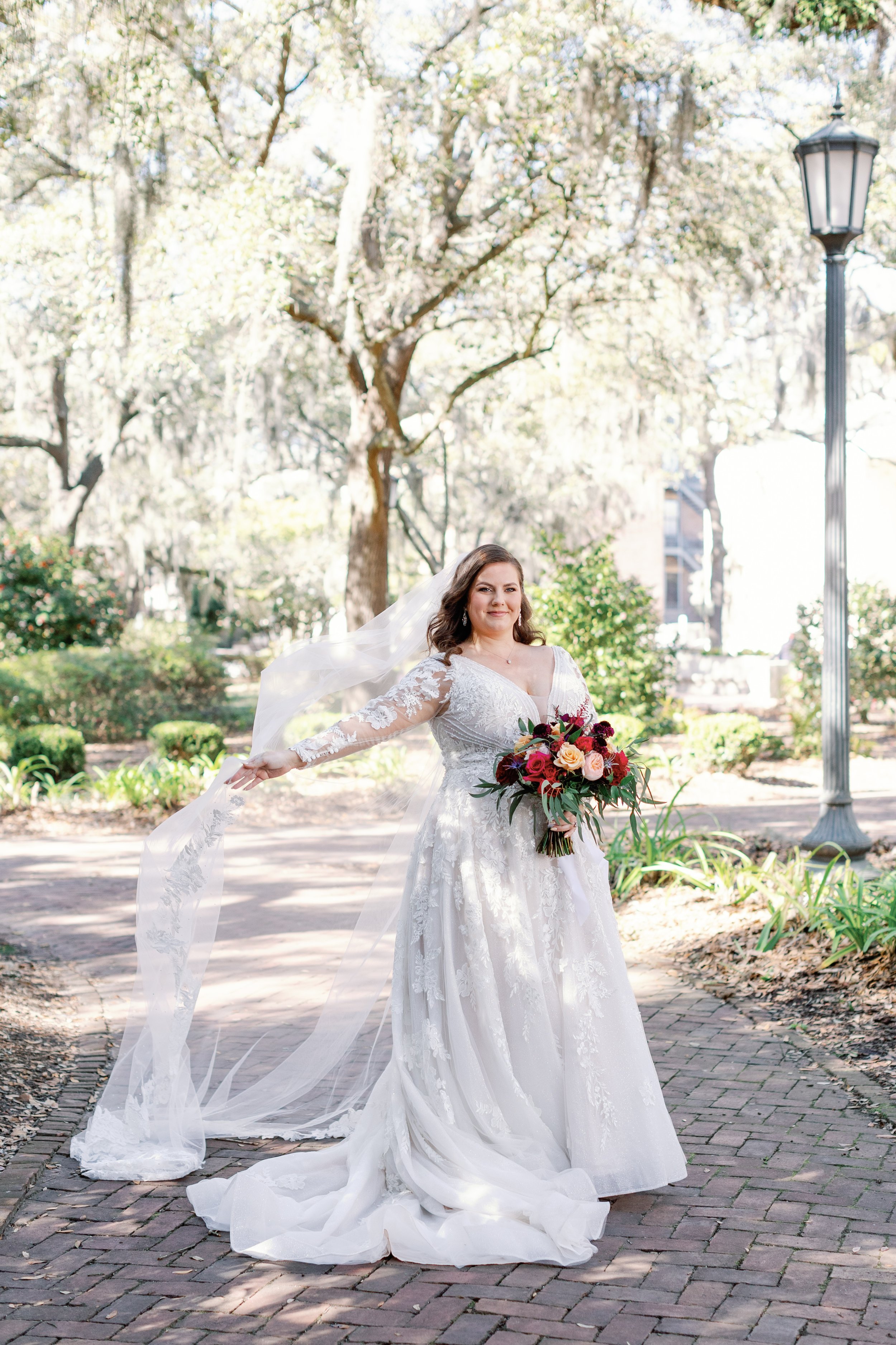 Savannah-bride-in-elegant-beaded-long-sleeve-lace-wedding-dress-essex-by-sottero-and-midgley-purchased-from-savannah-bridal-shop-ivory-and-beau-4.jpg