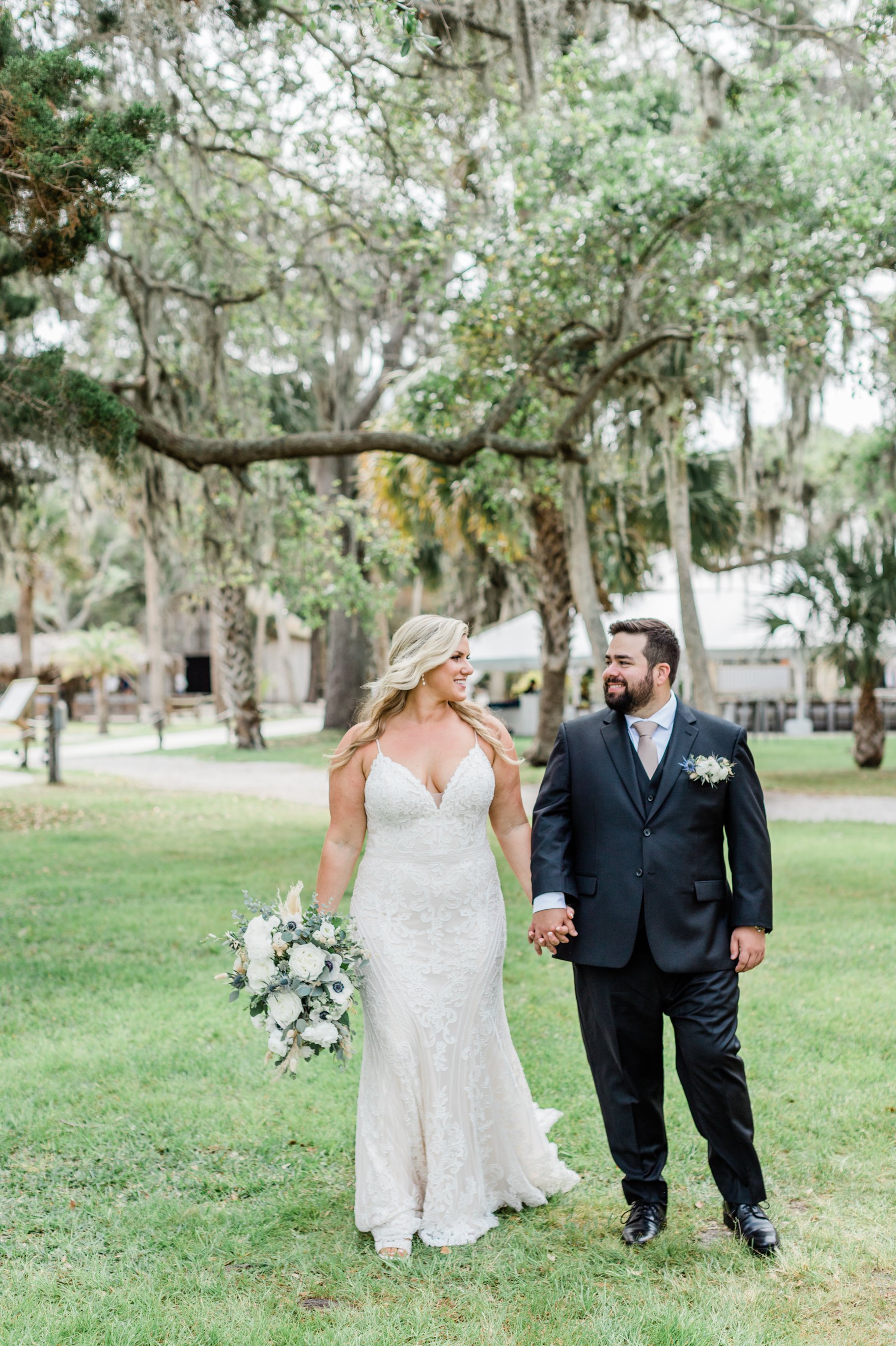 ivory-and-beau-bride-lindsey-pictured-in-sexy-romantic-fitted-lace-wedding-dress-named-cambrie-by-sottero-and-midgley-purchased-from-savannah-bridal-shop-ivory-and-beau-1.jpg