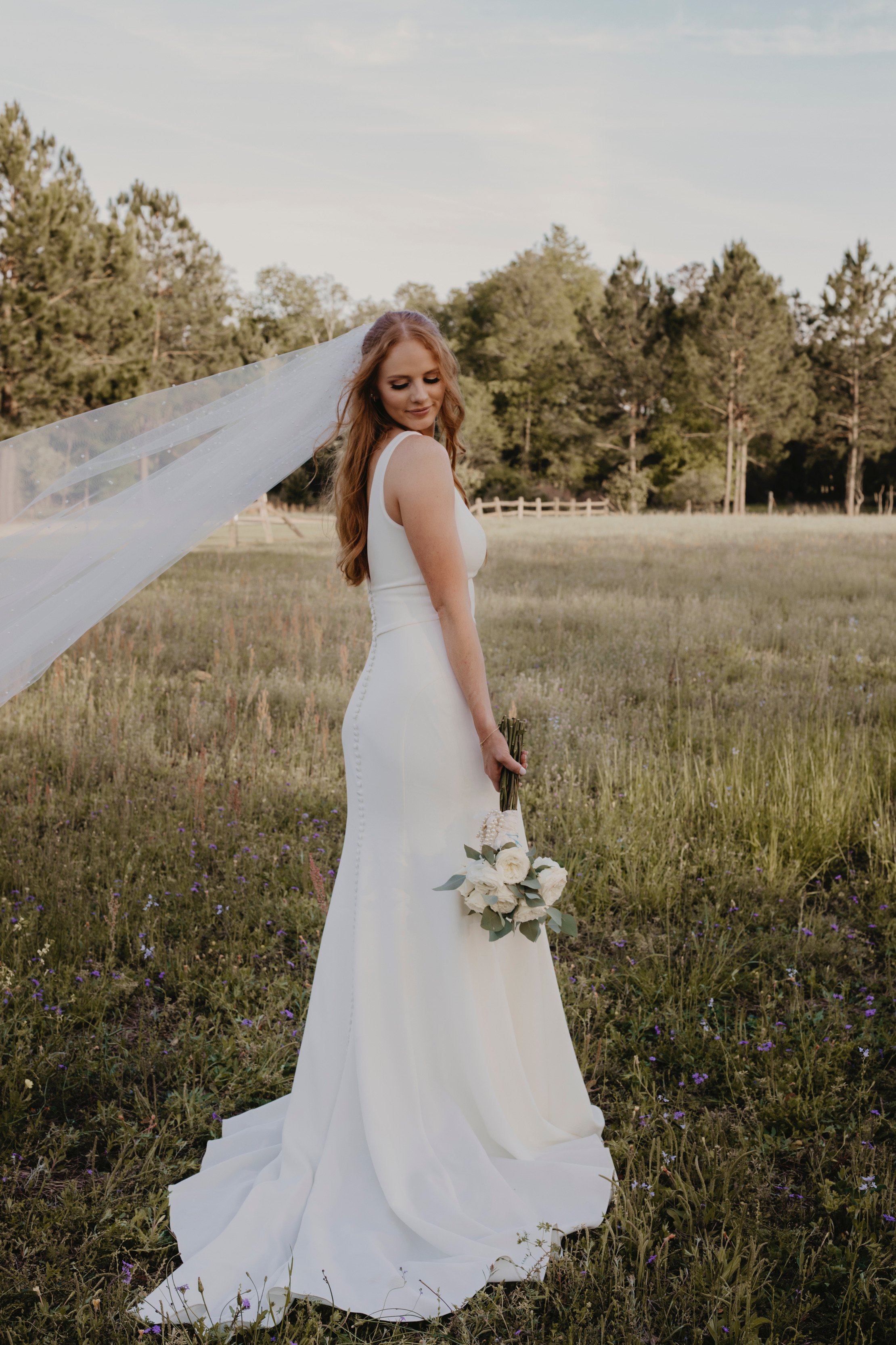ivory-and-beau-bride-teasie-pictured-in-romantic-sleek-modern-crepe-wedding-dress-named-theodora-by-rebecca-ingram-purchased-from-savannah-bridal-shop-ivory-and-beau-1.jpeg