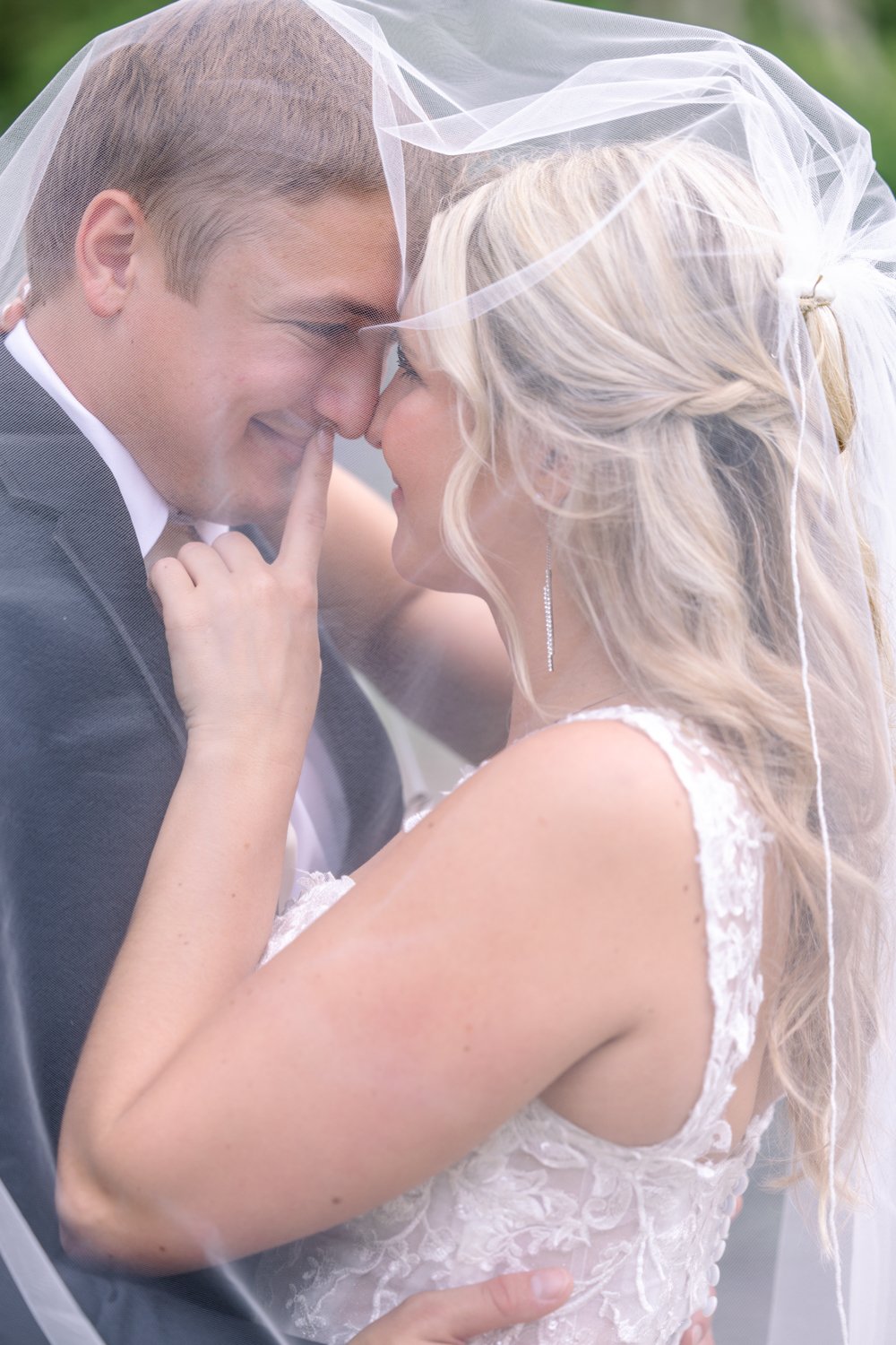 southern-bride-sabrina-in-the-katell-gown-by-maggie-sottero-a-classic-fit-and-flare-wedding-dress-with-sweetheart-neckline-and-sparkle-detail-purchased-from-savannah-bridal-shop-ivory-and-beau-5.JPG