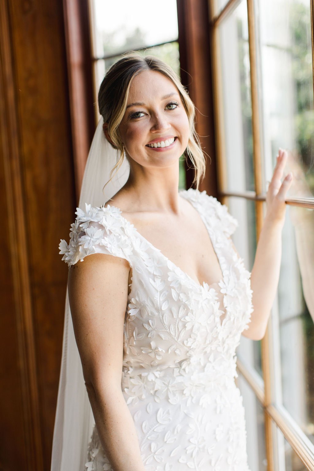 savannah-bride-katelyn-in-darcy-by-made-with-love-a-chic-modern-wedding-dress-witth-cap-sleeves-and-3d-floral-applique-purchased-from-savannah-bridal-shop-ivory-and-beau-2.jpg