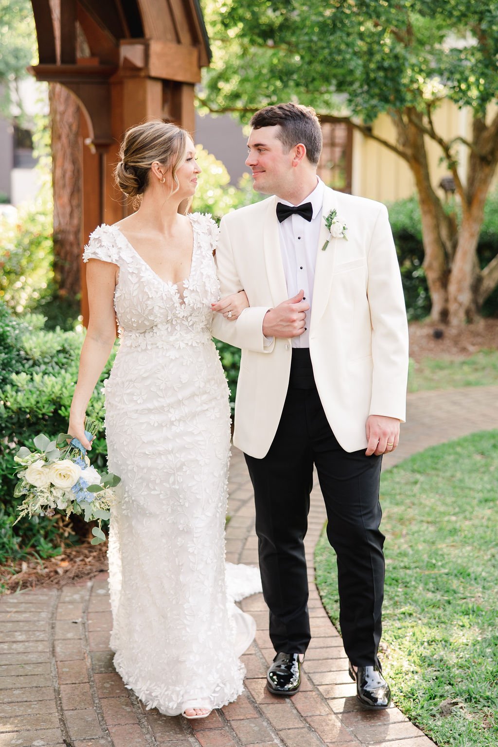 savannah-bride-katelyn-in-darcy-by-made-with-love-a-chic-modern-wedding-dress-witth-cap-sleeves-and-3d-floral-applique-purchased-from-savannah-bridal-shop-ivory-and-beau-4.jpg