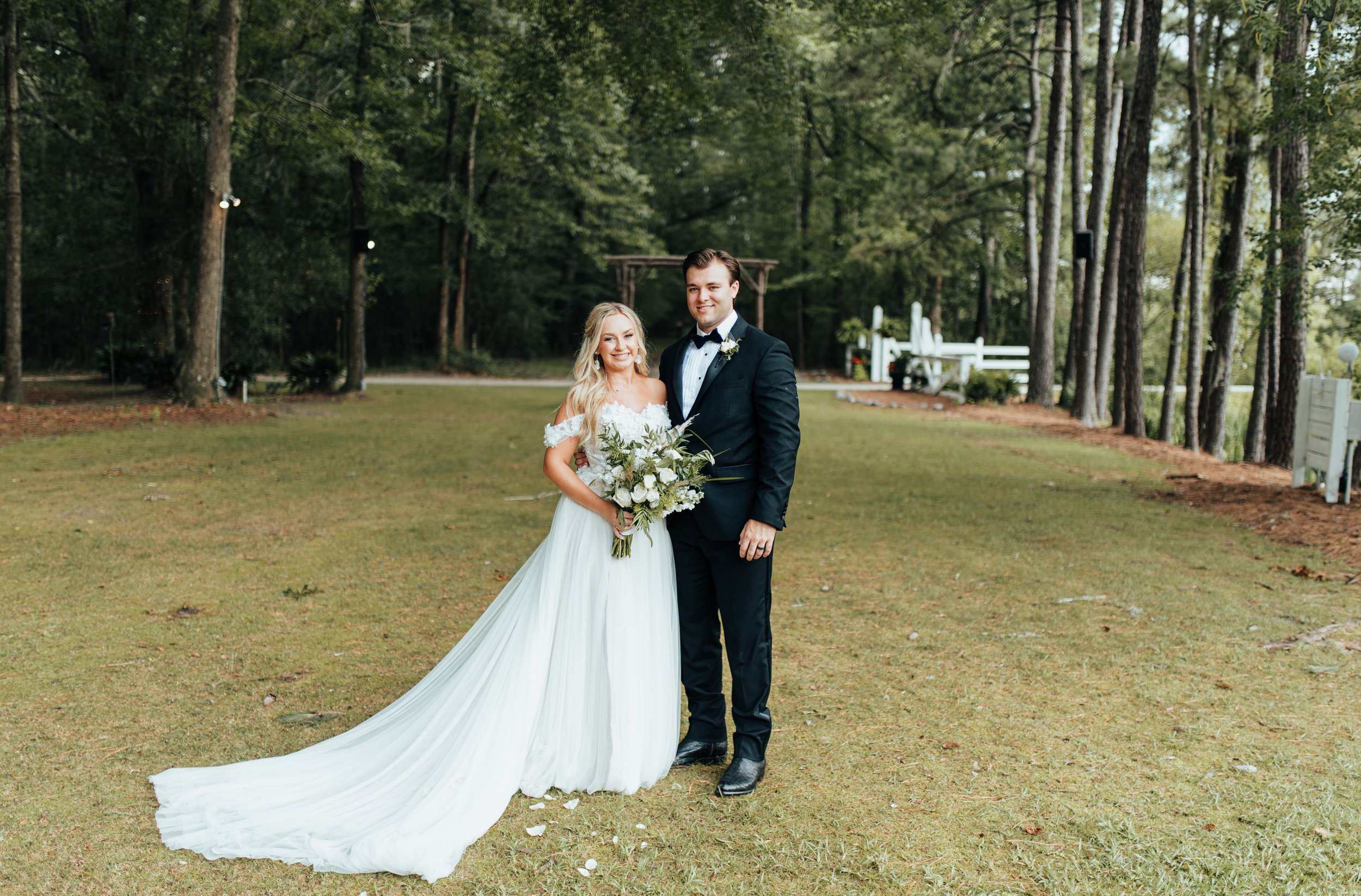 savannah-bride-halee-in-mirra-by-rebecca-ingram-an-a-line-wedding-dress-with-tulle-skirt-and-3d-lace-bodice-purchased-from-savannah-bridal-shop-ivory-and-beau-5.jpeg