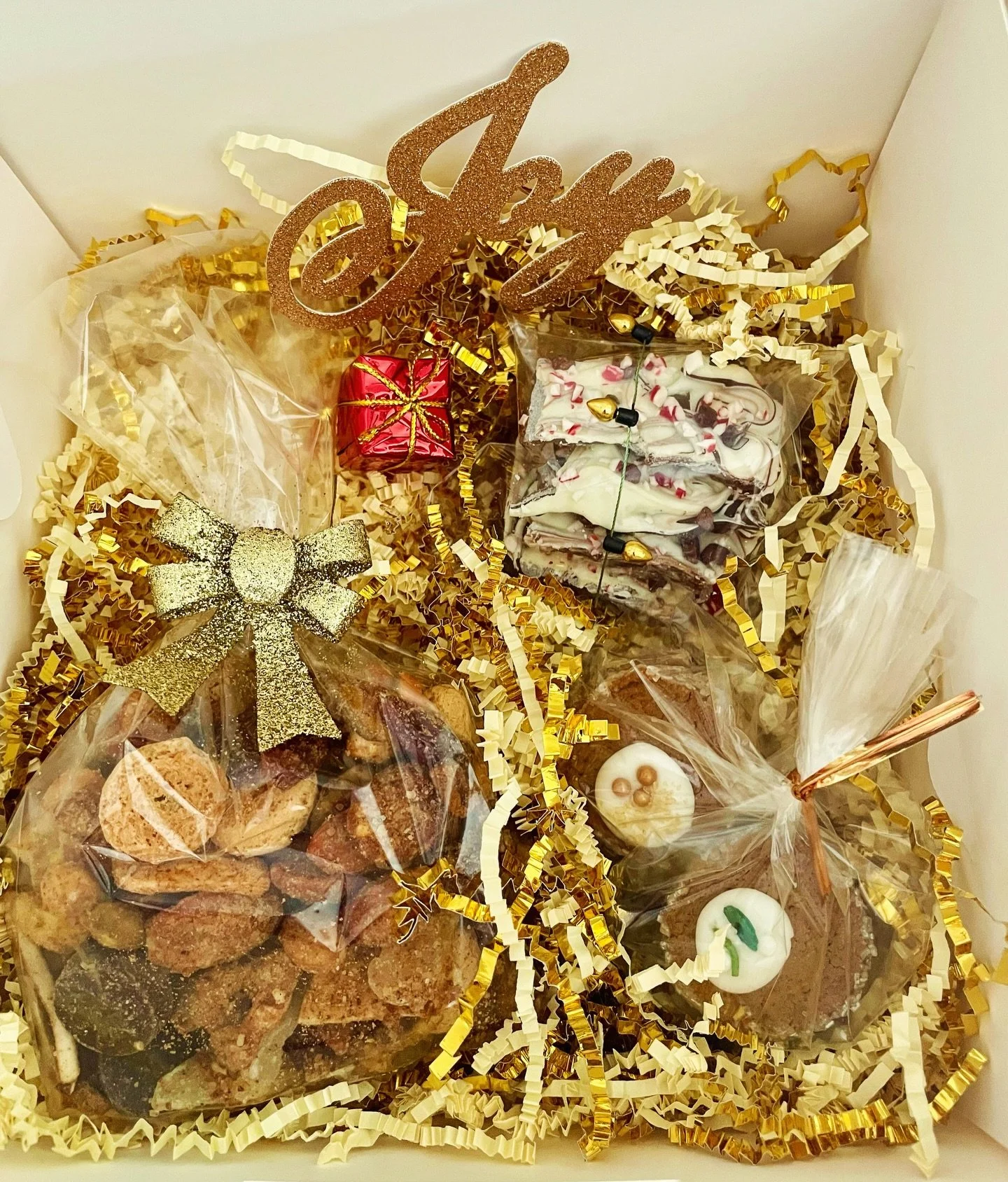 One of my favorite Christmas activities is making goodies for family, friends, neighbors, clients, and all the people in my life I want to thank for their presence over the past year. These custom boxes included spiced trail mix, crushed candy cane &