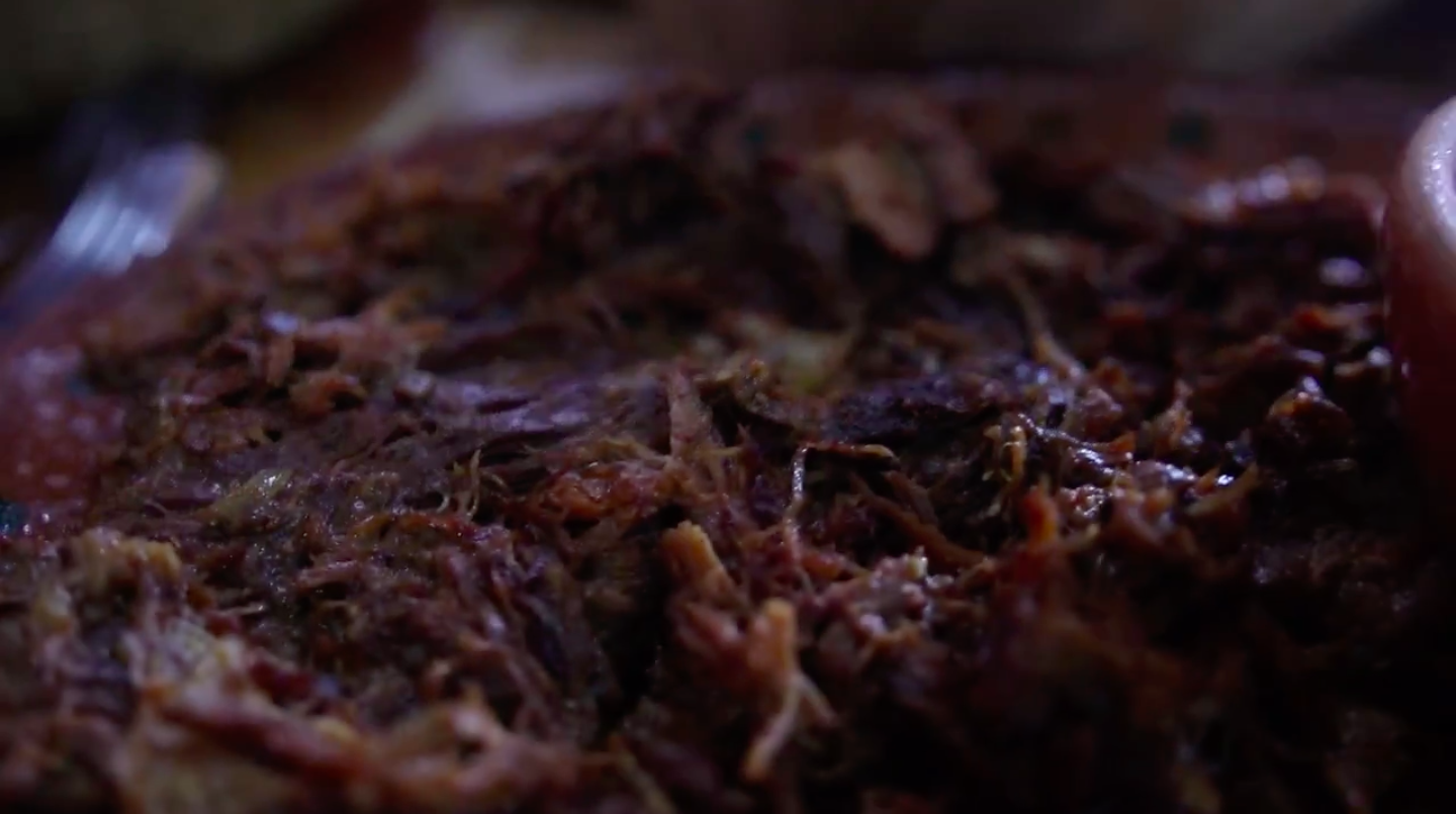 Borrego Tatemado — Fire-roasted lamb, a house specialty