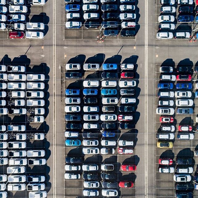 New car logistic storage. #abstractphotography #industrialabstract #drone  #carpark  #cars #storage #logistics