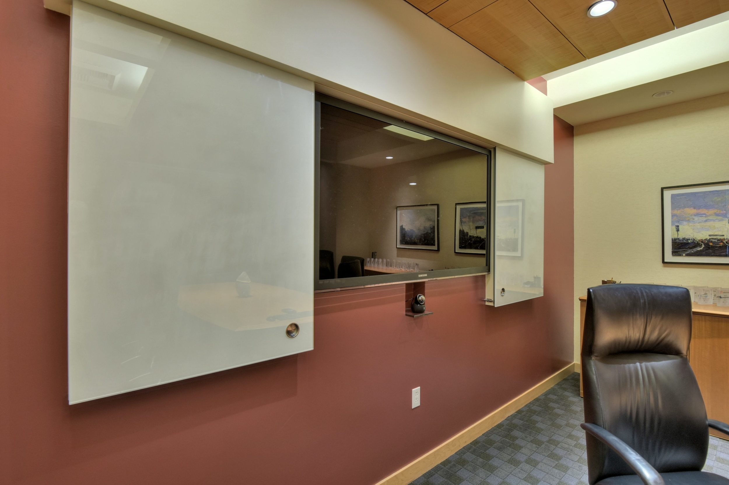 Executive boardroom with on-wall TV