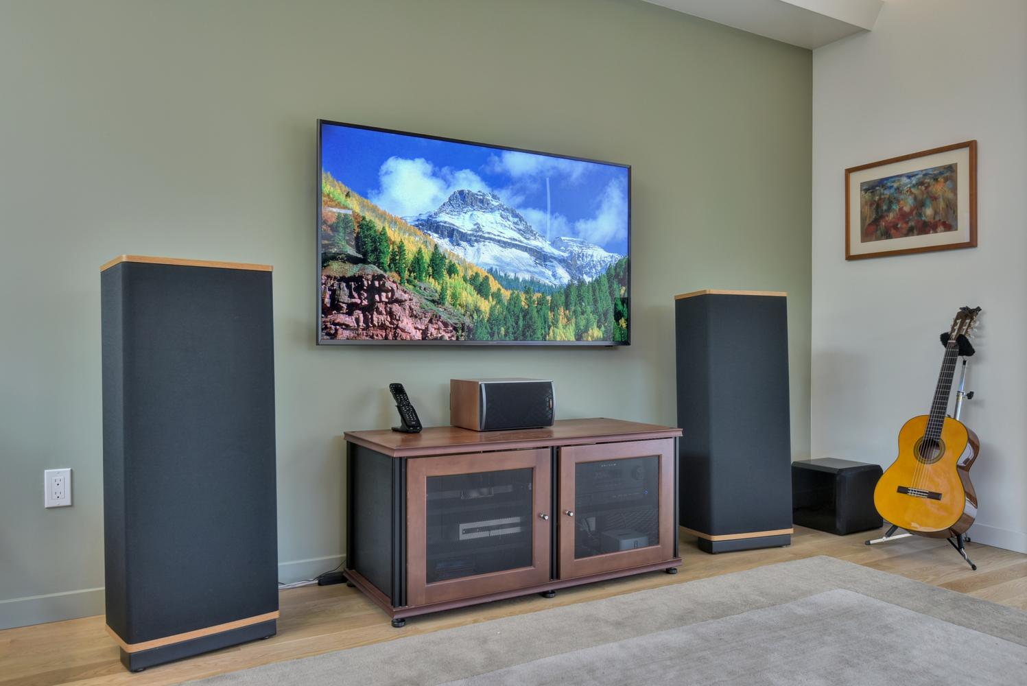 Family room Samsung 4K UHD TV with KEF 5.1 surround sound home theater system