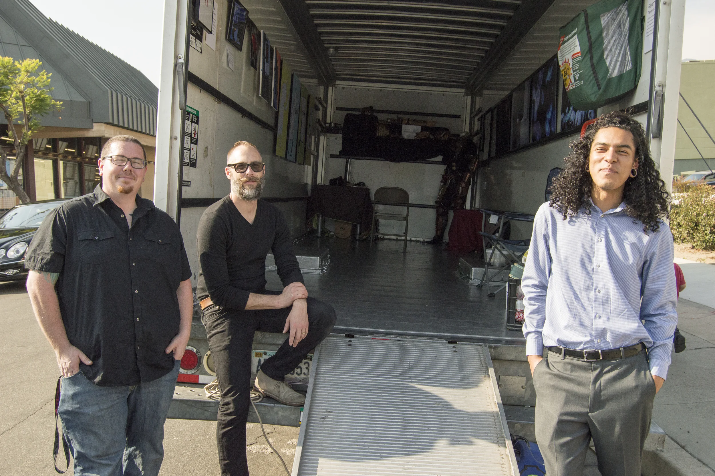 Don Hooker, Michael S. Oldfield and Carlos Monterosa standing by the gallery.