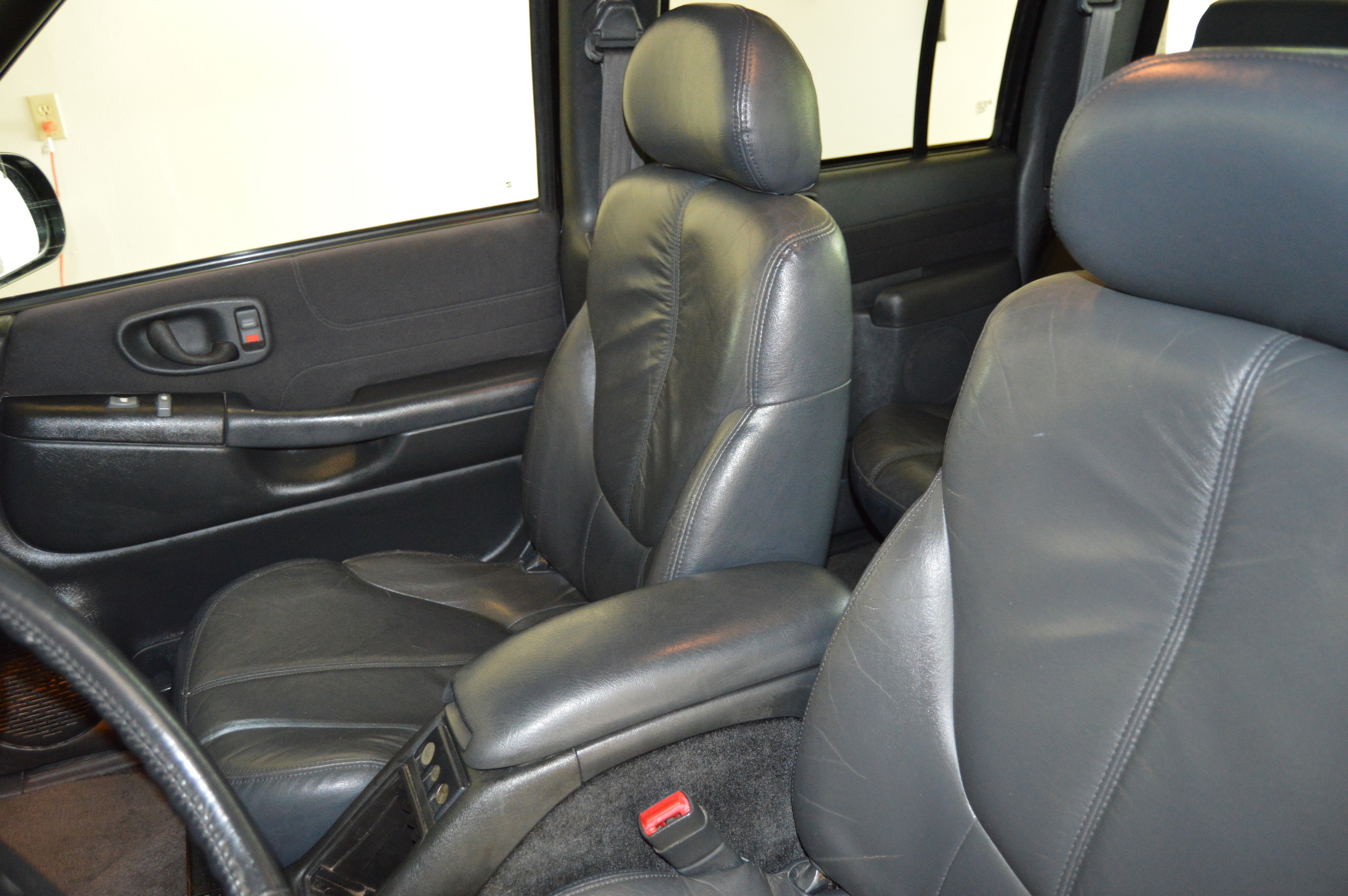 Leather seats shampooed and conditioned