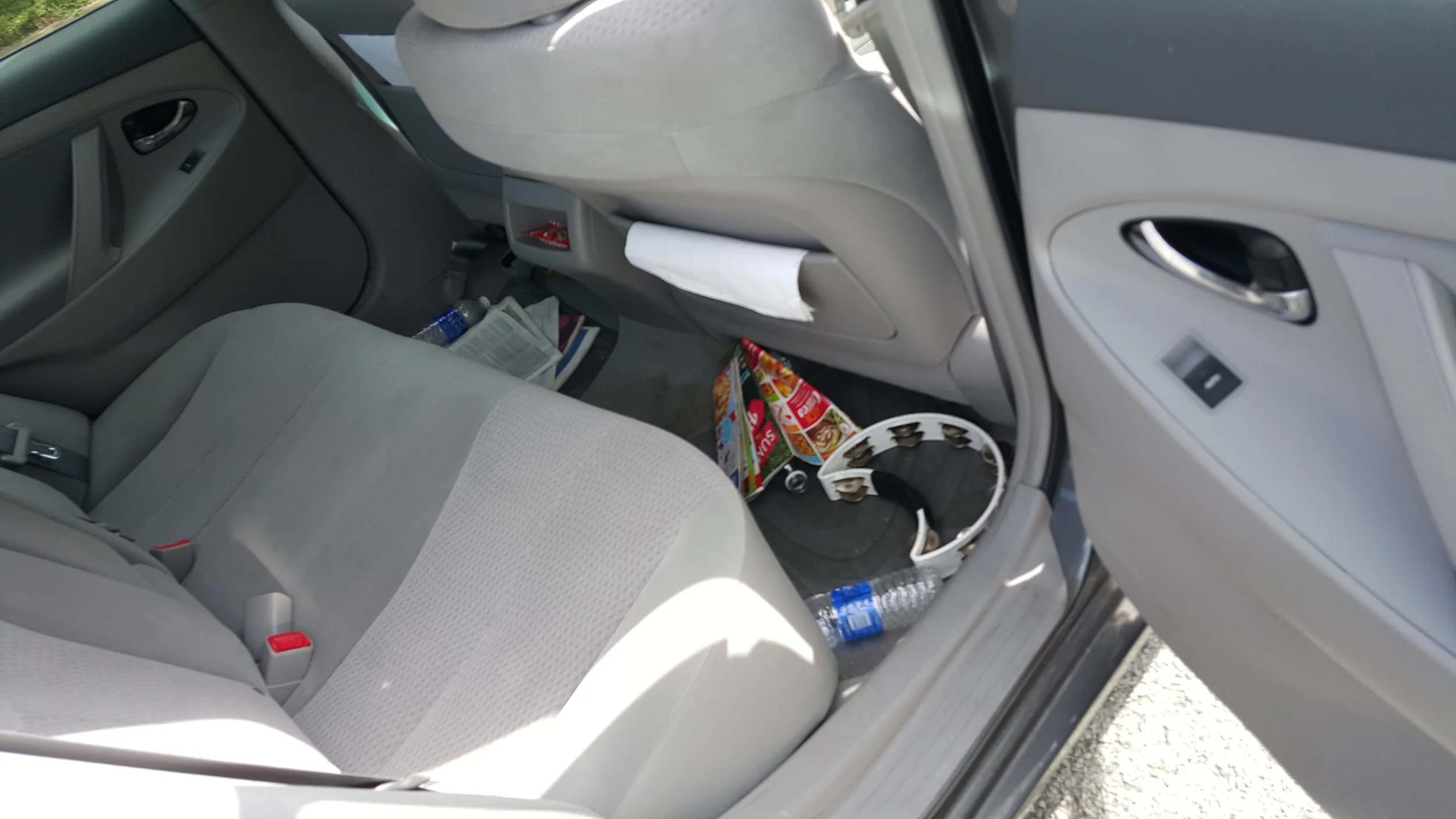 Trash and light staining to the back seats.
