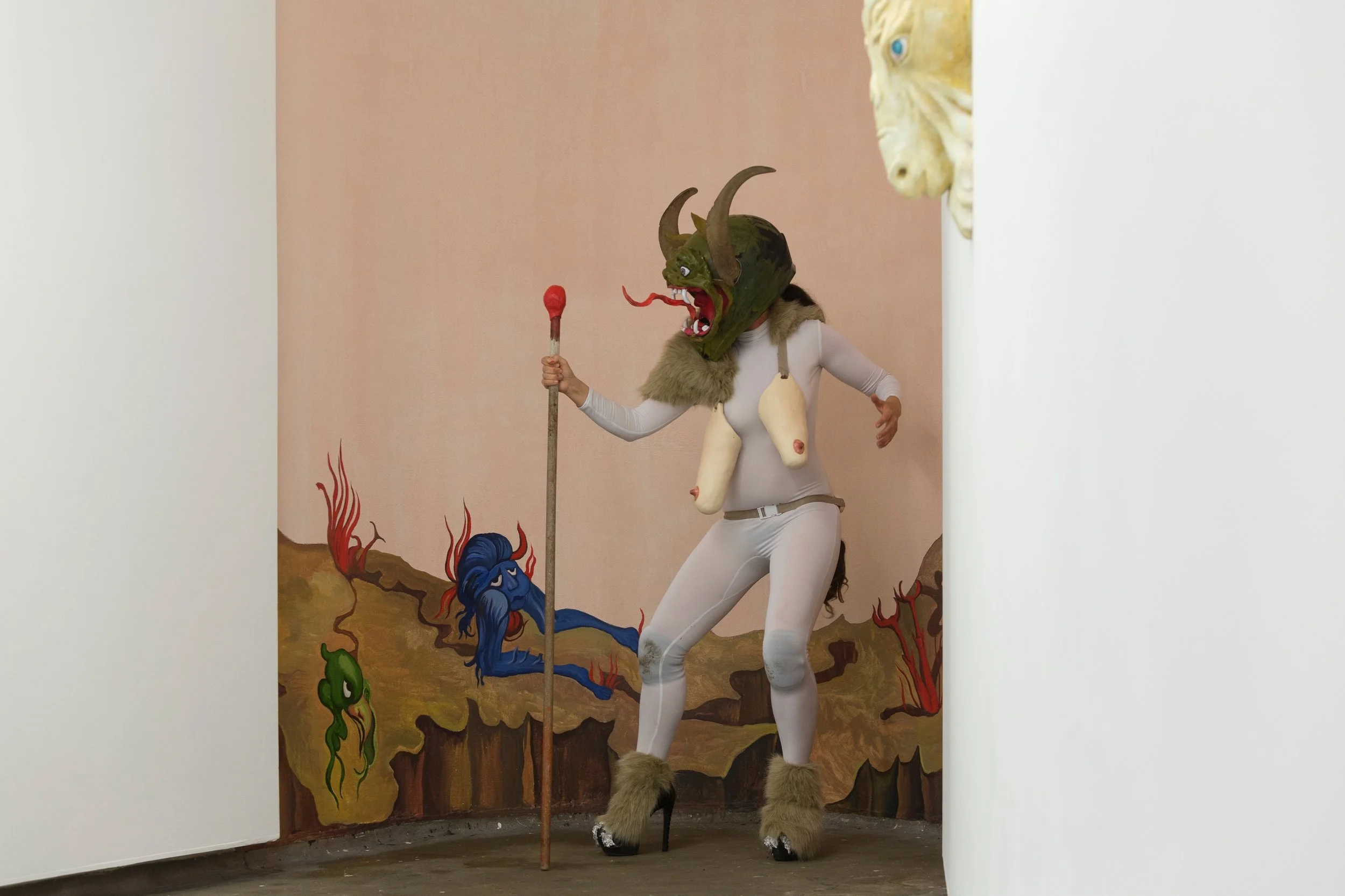 She Devil performed by Legs 11 11, hand built ceramic ,remodelled bike helmet, bull horns, polymer clay, oil paint, fake fur, remodelled stilettos, 2017