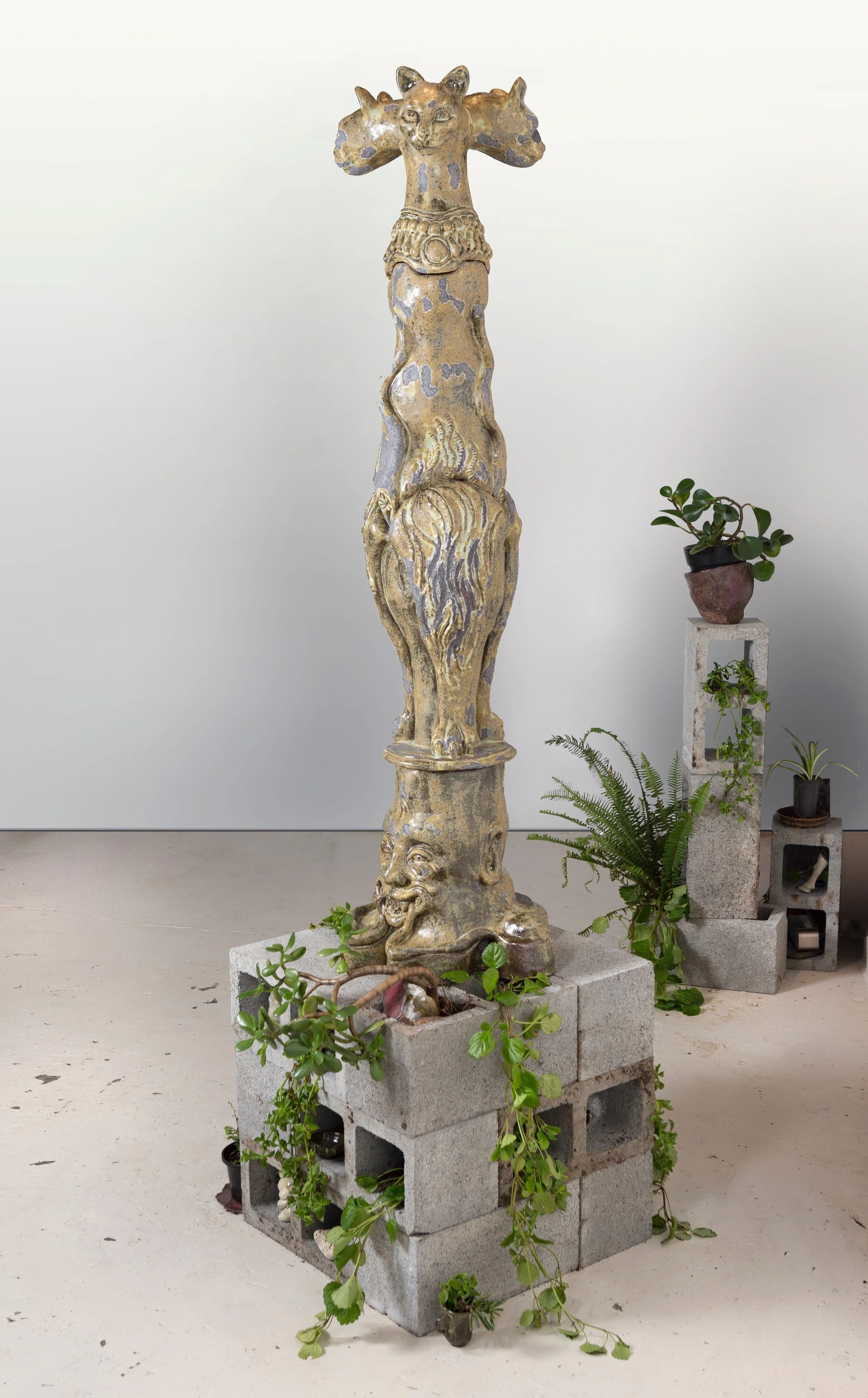 Mystic Kitten 2015, hand built ceramic, stoneware glaze, bessa blocks, plants, small sculptures, pots, cups, all hand made ceramic, sound embedded into sculpture by Adam Cox 