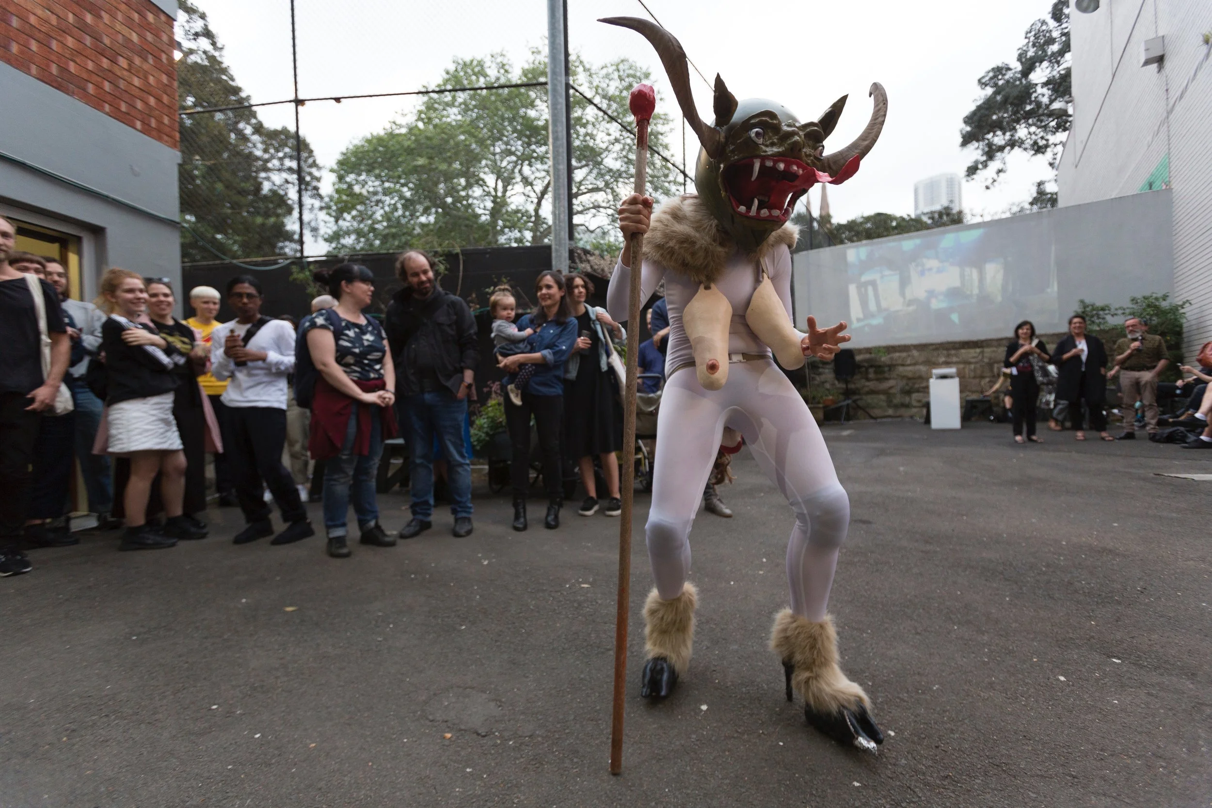 She Devil performed by Legs 11 11, hand built ceramic ,remodelled bike helmet, bull horns, polymer clay, oil paint, fake fur, remodelled stilettos, 2017