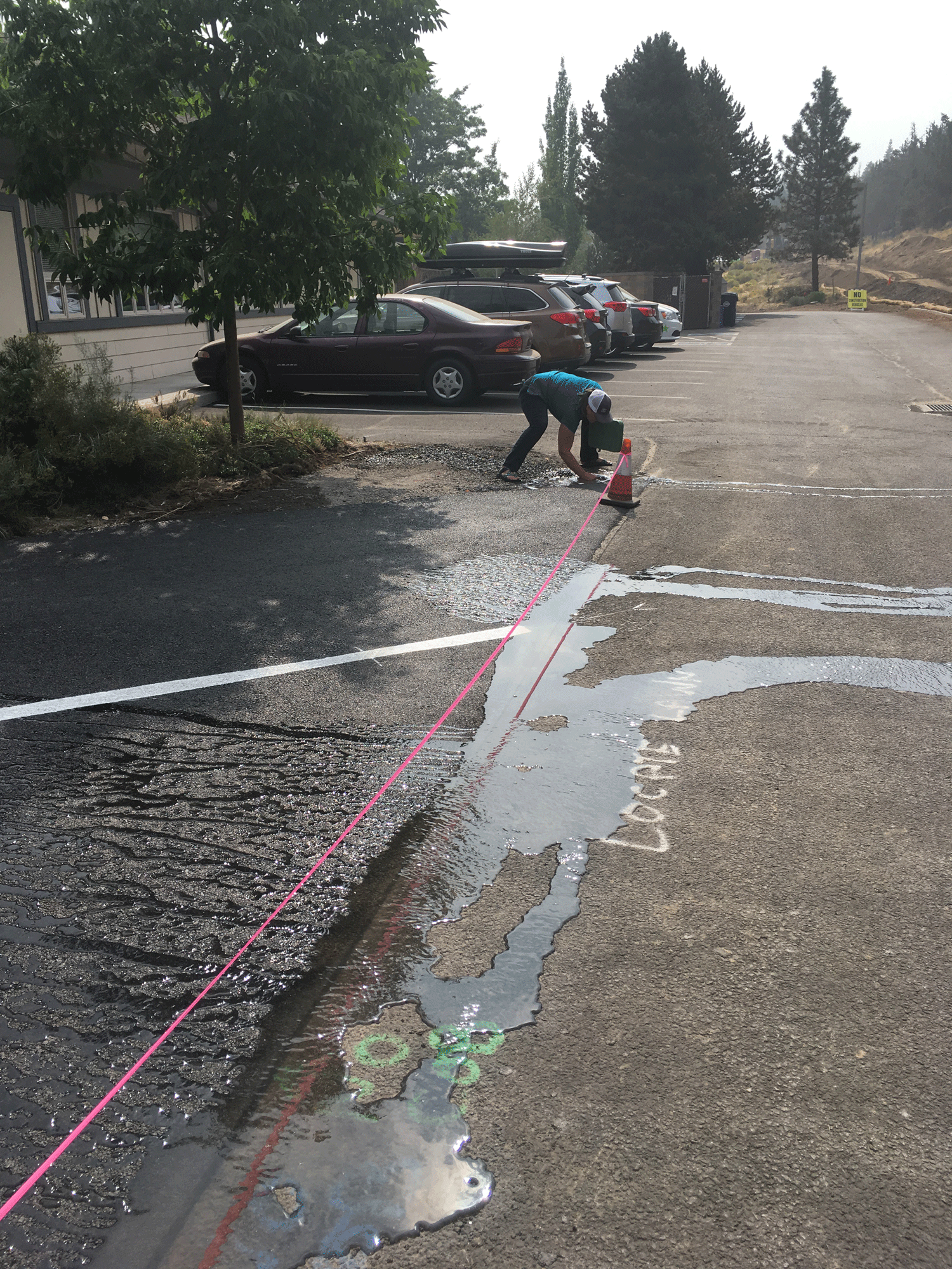 There was more than just one sprinkler head that was affected by the new asphalt paving. an irrigation consultation to locate sprinklers and advise on how to cap them would have been a fraction of the time and money it took to locate the paved-over sprinklers and to make the necessary repairs.