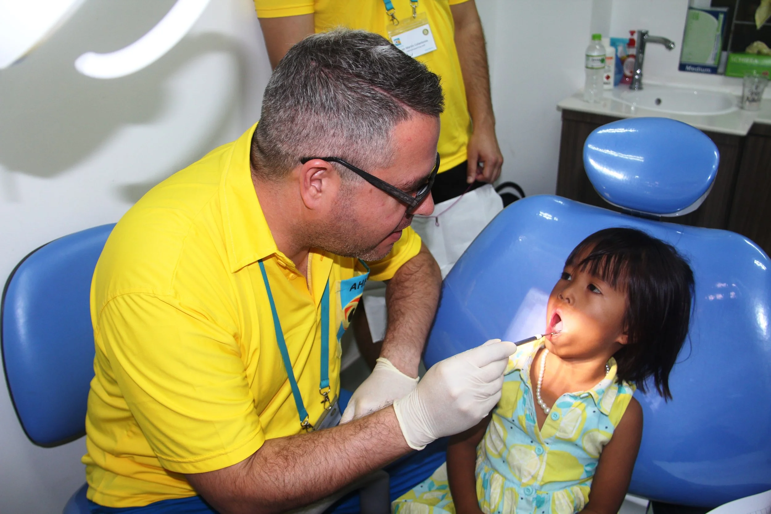 A young patient receiving dental treament