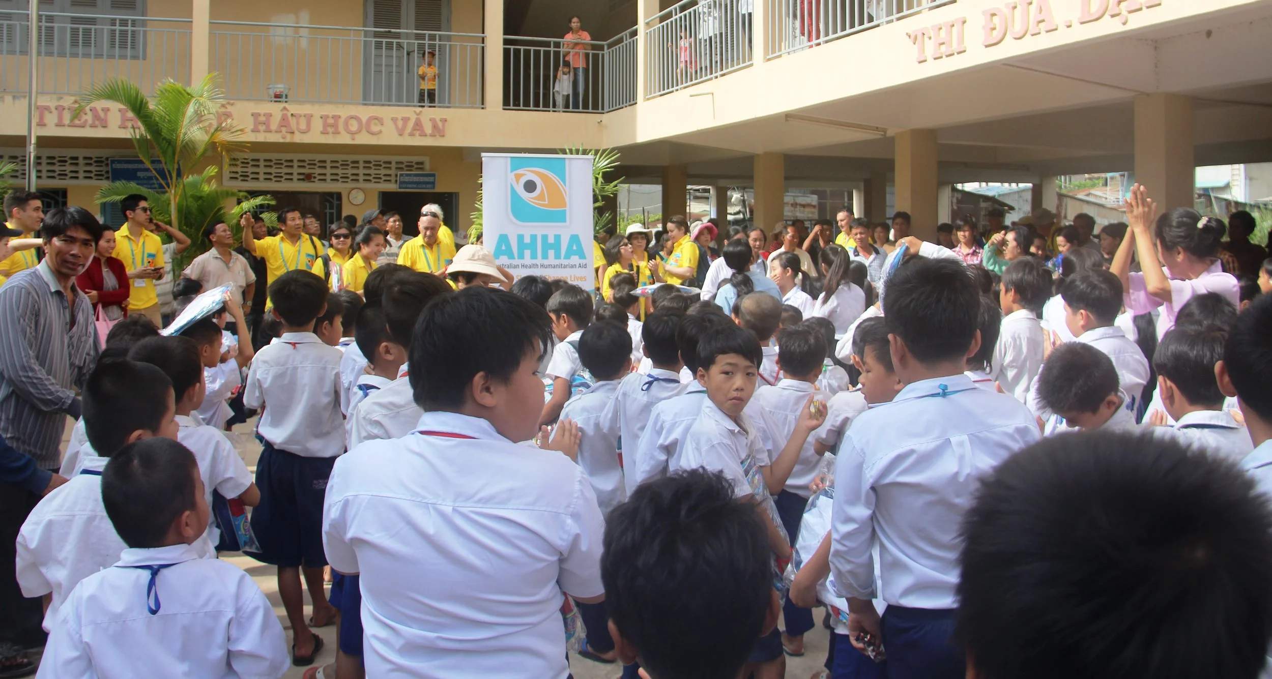 School children receiving gifts