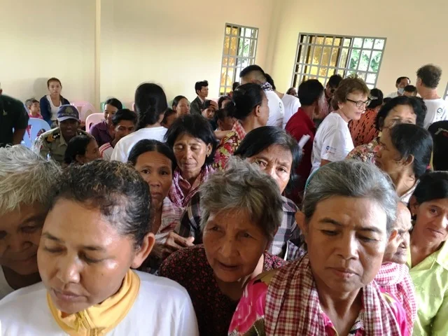 Poor villagers waiting for eye screening