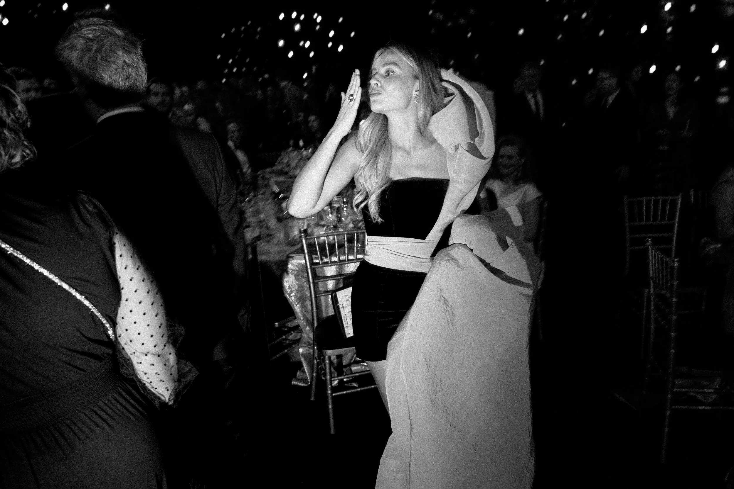 Margot Robbie, departs the 30th SAG Awards
