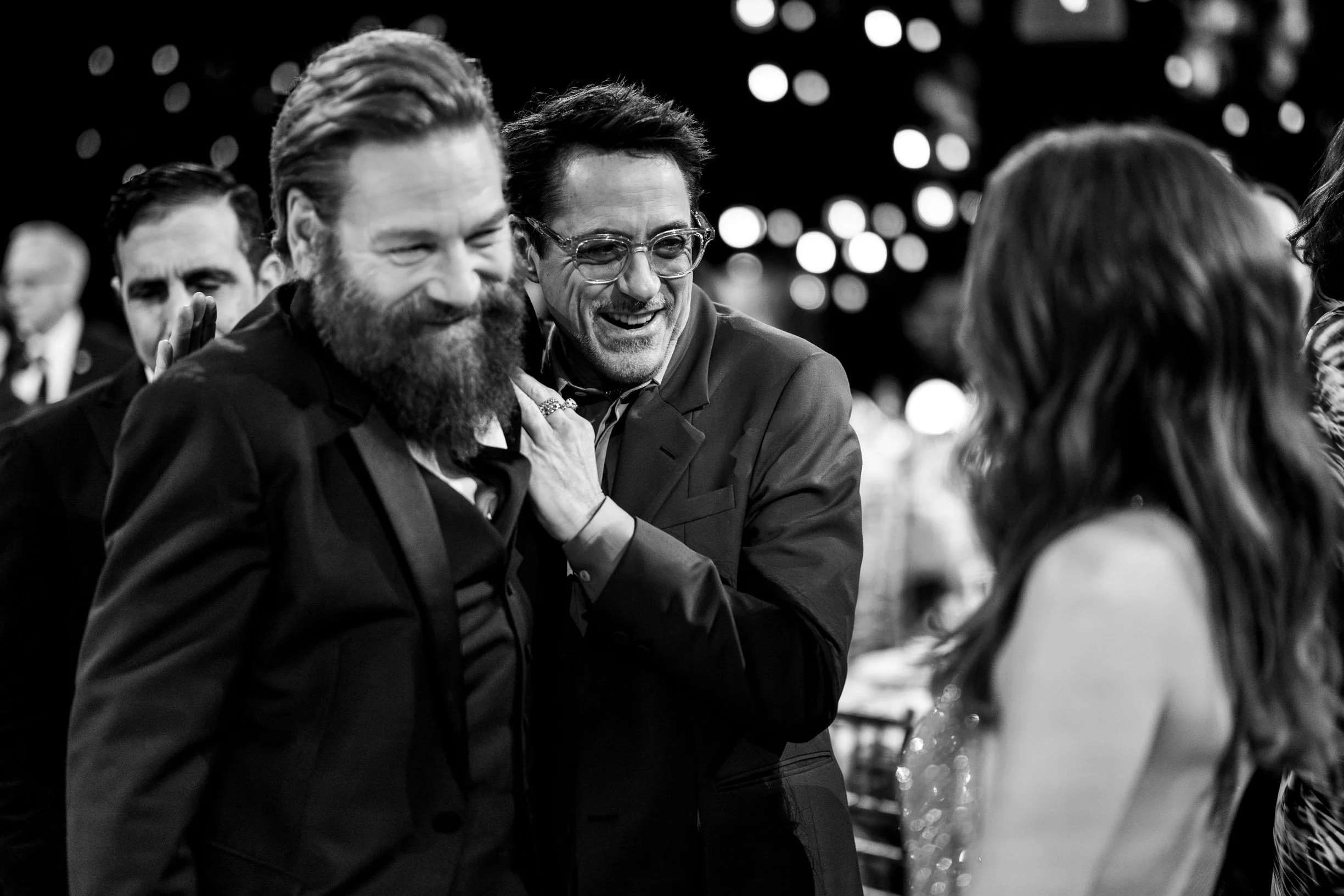 Robert Downey, Jr., and Kenneth Branagh, with Susan Downey