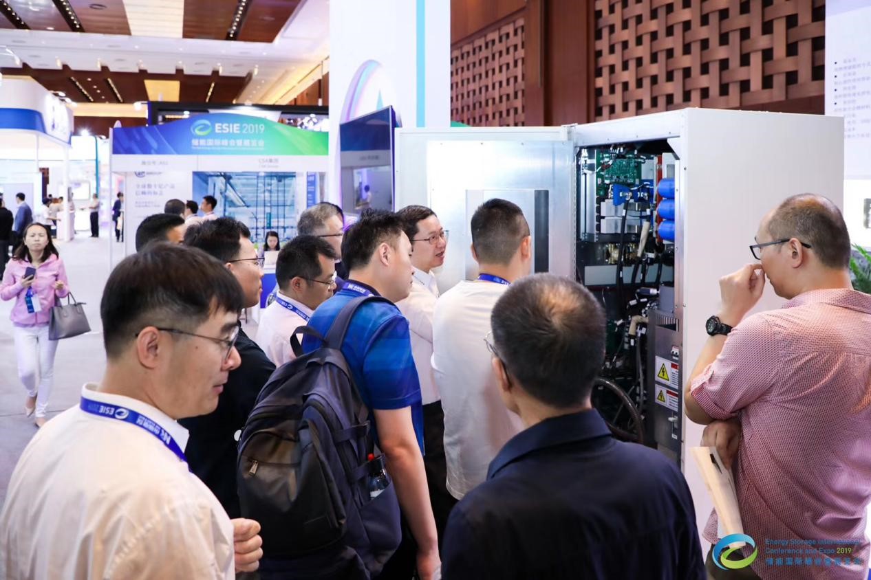 Attendees get an up-close look at an exhibitor display