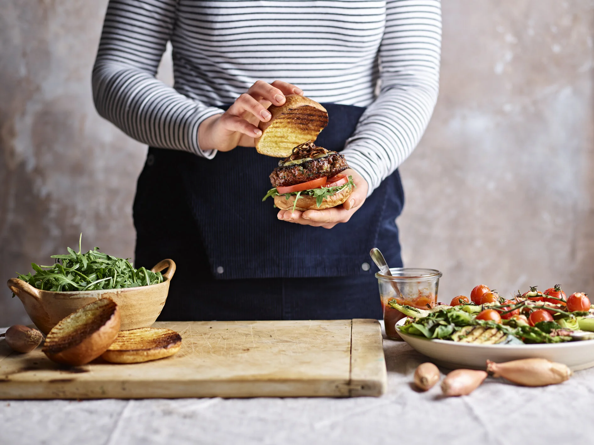Crispy UK Shallots with Venison Burger and Blue Cheese (with hands).jpg